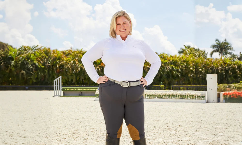 Plus size rider wearing R.J. Classics standing in a show ring