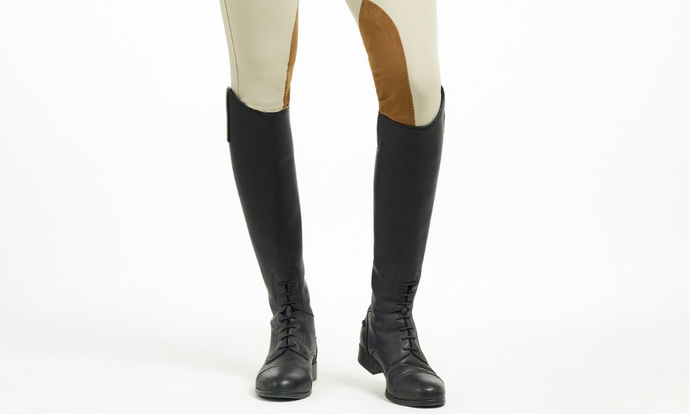 equestrian wearing tall boots