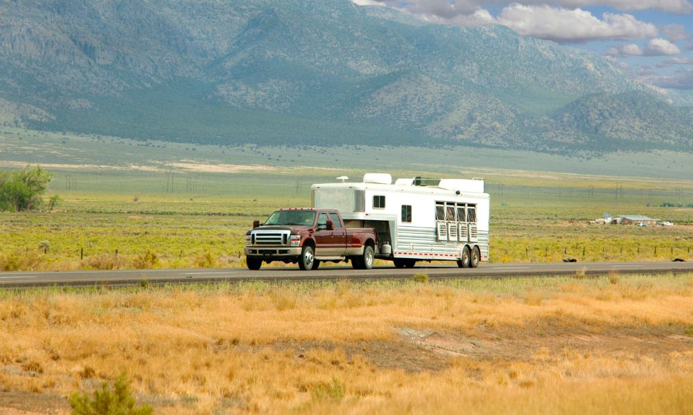 truck pulling horse trailer